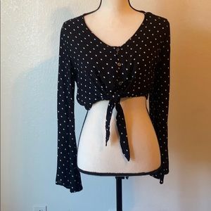 Black polka dot bell sleeve crop top